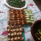 Sorry... blurry. The latke cupcakes are all the way at the back of the table. The other crostinis are in the foreground.